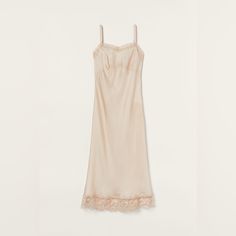 Simone Rocha X H&M. Calf-Length Dress In Slightly Stretchy Satin Made From Naia Renew Cellulosic Yarn And Viscose. Lace Trim At The Top And Hem. Unlined. Size: Xs Shell: Acetate 60%, Viscose 40% Embroidery: Polyester 100% Feminine Sheer Maxi Dress, Beige Silk Dress With Lace Trim, Feminine Sheer Slip Dress, Feminine Beige Midi Length Slip Dress, Feminine Beige Midi Slip Dress, Fitted Beige Slip Dress, Feminine Beige Slip Dress, Feminine Sheer Daywear Dresses, Feminine Midi Length Slip Dress For Daywear