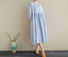 "Casual Big Size Linen Spring and Summer Long Dresses For Women/Soft Linen Dress ★Color:Blue ★Material:100% Linen ★Model Size: -- Model wear size M -- Model is 5'4\"/104lb -- Model measurements (bust 31\" / waist 28.3\" / hips 35\" ) ★ In order to make it more suitable for you. please tell me your body measurements : -- your Height -- your Weight -- your Bust circumference -- your Upper Arm circumference -- Phone number for shipping If you have some specific request or special character, such as Casual Loose Blue Dress, Blue Relaxed Fit Solid Color Dress, Oversized Solid Color Dress For Spring, Blue Relaxed Fit Dress, Oversized Solid Color Spring Dress, Relaxed Fit Blue Dress, Oversized Spring Dresses, Blue Plain Dresses For Spring, Blue Plain Spring Dresses