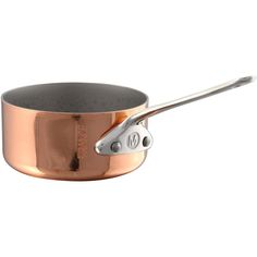 an empty copper pan with a metal handle