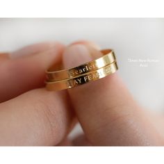 "Personalized and meaningful gift for you and your loved one. Please, read our descriptions before placing your order. SOLD SEPARATELY. PS: Due to the small size of the band ( 2mm ), we can only engrave so big. No color is used to fill in the letters to give contrast. Please, dont expect engraving to be like printing - very visible. Engraving is more subtle in appearance as light reflects differently off of the engraving as compared to the metal surface. Sizing Standard US sizing. Our ring is tr Elegant Personalized Midi Rings For Anniversary, Customizable Engraved Adjustable Round Ring, Customizable Yellow Gold Jewelry For Promise, Adjustable Yellow Gold Personalized Rings, Adjustable Personalized Yellow Gold Rings, Personalized Yellow Gold Engraved Ring For Promise, Personalized Yellow Gold Engraved Promise Ring, Personalized Engraved Yellow Gold Promise Ring, Classic Personalized Promise Jewelry