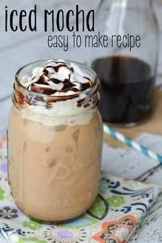 iced mocha in a mason jar with whipped cream on top