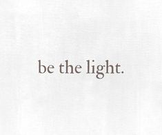 the words be the light written in brown on white paper