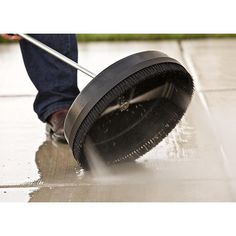 a person is cleaning the floor with a mop