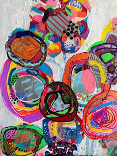 an abstract painting with many different colors and shapes on it's surface, including circles