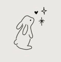 a black and white drawing of a rabbit with stars in the sky above it's head