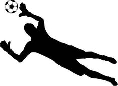 a silhouette of a man kicking a soccer ball in the air with his leg up