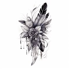 an artistic tattoo design with feathers and flowers