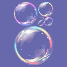 three soap bubbles floating in the air on a purple and blue background with space for text