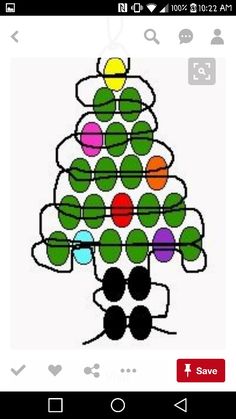 a drawing of a christmas tree made out of circles on white paper with colored dots