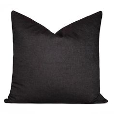 a black pillow on a white background