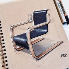 a drawing of a chair sitting on top of a piece of paper next to a marker