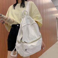 Main Material: nylon Lining Material: Polyester Casual Student Backpack, Functional Shoulder Bag For Students, Casual White Backpack With Zipper Closure, White Backpack With Zipper For Summer, White Backpack With Zipper Closure For Summer, White Zippered Backpack For Summer, Large Capacity White Backpack For Summer, Trendy White Canvas Backpack, White Casual Backpack With Zipper Pocket