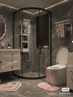 a bathroom with grey marble walls and flooring