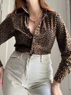 Vintage blouse from 80s Timeless model, fitted, little bit stretchy High quality fabric and sewing Perfect condition Modeled on person 172cm tall, 94cm bust Measurments: Shoulders - 43cm 17" Underarms - 50cm 20" Lenght - 66cm 26" Fitted Leopard Print Blouse For Work, Fitted Tiger Print Top For Fall, Chic Long Sleeve Leopard Print Top, Chic Leopard Print Long Sleeve Tops, Stretch Leopard Print Blouse For Fall, Fall Leopard Print Stretch Blouse, Fall Stretch Leopard Print Blouse, Leopard Print Button-up Top For Work, Leopard Print Long Sleeve Top For Work