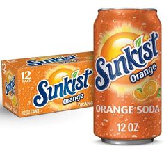 an orange soda can next to a box of sunstart orange soda on a white background