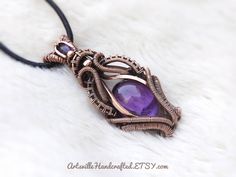 "Wire Wrapped Amethyst Pendant, Empath Protection Amethyst Necklace, Elven Jewelry, Protection Amulet Necklace, Healing Amethyst Gift for Her Unique Handmade Artisan Jewelry !! Original Designs by ArtsvilleHandcrafted If you love unique designs and Amethyst then...this beauty is perfect for you!! This piece has a gorgeous Amethyst, garnet and is created with Pure Copper Wires. IMPORTANT Select your choice of length for the necklace. All Jewelry is Gift Wrapped!! And dispatched within 1-2 working Purple Amethyst Amulet Jewelry, Wire Wrapped Stone Jewelry, Empath Protection, Elven Jewelry, Amethyst Healing, Protection Amulet, Amulet Necklace, Wire Wrapping Stones, Wire Weaving