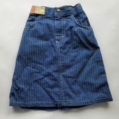 These are true vintage. They probably are from the 80s. They are made in USA and are 100% cotton They have a pin stripe detail. The back is elastic and it is still in good stretchy condition. Girls size 6X Vintage Blue Denim Skirt, Retro Medium Wash Cotton Skirt, Retro Blue Cotton Denim Skirt, Vintage Cotton Denim Skirt, 90s High Waist Cotton Denim Skirt, 90s Style High Waist Cotton Denim Skirt, Retro Denim Skirt For Spring, 90s Cotton Denim Blue Denim Skirt, 90s Denim Blue Cotton Denim Skirt