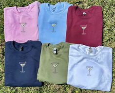 Embroidered Dirty Martini Sweatshirt, Embroidered Martini Shirt, Bachelorette Party Gifts, Embroidered Tini Time Sweatshirt, Embroidered Retro Cocktail Sweatshirt, Signature Cocktail Sweatshirt Get ready to shake things up with our "Dirty Martini" embroidered crewneck! 🍸✨ This crewneck isn't just an outfit; it's a stylish celebration of the bold and briny essence that comes with sipping on a classic Dirty Martini. 🌟 Why choose our Dirty Martini crewneck? -Olive the Details Embroidery: Featurin Fitted Long Sleeve Embroidered T-shirt, Fitted Long Sleeve Top With Custom Embroidery, Fitted Short Sleeve Tops With Custom Embroidery, Fitted Tops With Custom Embroidery And Short Sleeves, Embroidered Cotton Top For Party, Embroidered Martini, Martini Shirt, Retro Cocktail, Dirty Martini