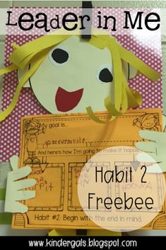 a paper doll holding a sign that says leader in me habit 2 freebiee