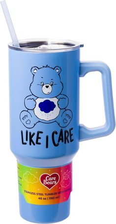 a blue cup with a bear on it and the words like i care printed on it