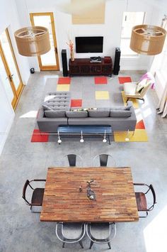 an overhead view of a living room and dining area