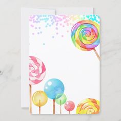 colorful lollipops and bubbles on white paper