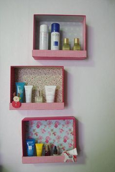 two pink shelves with personal care items on them