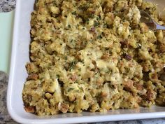 a casserole dish with meat and cheese on it, ready to be eaten