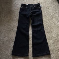 Dark Wash Flare Jeans With A Zip And Button Closure. Size 25s Gap Black Jeans For Fall, Black Flare Jeans, Dark Wash Flare Jeans, Things I Need To Buy, Desi Girl, Gap Jeans, Jeans Color, Fancy Dresses, Colored Jeans