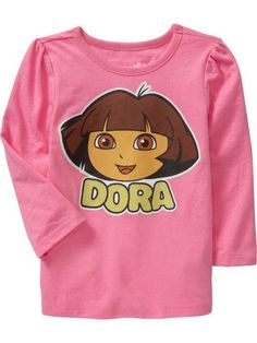 Item Description: For sale is an adorable Old Navy Dora The Explorer Long Sleeve Graphic Tee.  This shirt is brand new with tags and was purchased from an Old Navy retail store.  This is the adorable character from the Nick Jr. show of the same name. Fabric content is 50% cotton and 50% polyester.  The shirt is easy to care for, just machine wash and tumble dry. All items come from my smoke-free location. Be sure to check my eBay store for many other great deals on Ann Taylor clothing, J.Crew cl Cotton Character Print Tops, Pink Long Sleeve T-shirt With Character Print, Playful Pink Tops With Character Print, Character Crew Neck Cotton Top, Character Style Cotton Short Sleeve Tops, T Shirt Long Sleeve, Long Sleeve Graphic Tee, Top Girls, Nick Jr