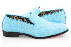 Create a smooth impression in this boldly styled dress loafer with smooth curves and a sleek silhouette to accent its bright, glittered exterior, making it a great final touch to more flamboyant suit and tuxedo outfits. Men's Dress Loafer PU Leather Upper Rubber Sole Embedded Glitter Plain-Toe Slip-On Imported Mens Dress Loafers, Dress Loafers, Final Touch, Blue Glitter, Wedding Outfit, Men Dress, Rubber Sole, Pu Leather, Leather Upper