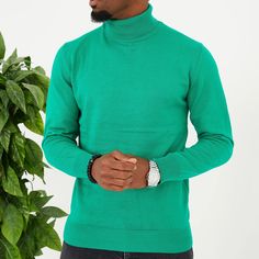 Slip into comfortable designer stylings in this handsome long-sleeved turtleneck with a traditional ribbed cuff design for versatility when paired with casual or semi-formal outfits. Trendy Long Sleeve Turtleneck With Ribbed Cuffs, Spring Turtleneck With Ribbed Cuffs And Long Sleeves, Spring Neutral Colored Turtleneck With Ribbed Cuffs, Casual Winter Funnel Neck Turtleneck, Classic Cotton Turtleneck For Winter, Casual Spring Turtleneck With Ribbed Cuffs, Spring Solid Turtleneck With Ribbed Cuffs, Spring Ribbed Cuff Turtleneck, Fall Solid Turtleneck Polo Sweater