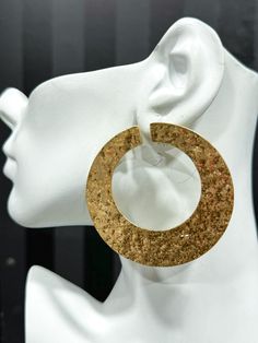 The Textured Gold Hoop Earrings are a stunning statement piece. Featuring a large, bold design with an intricate textured finish, these earrings are perfect for adding a touch of glamour to any outfit. Lightweight and easy to wear, they bring an elegant and contemporary flair to your style. Chic Textured Metal Earrings, Hammered Hoop Earrings For Party, Elegant Hammered Hoop Earrings For Party, Gold Stud, Bold Design, Gold Texture, Gold Hoop, Gold Earrings Studs, Stud Earring