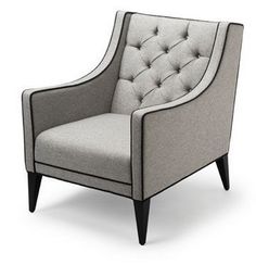 a gray and black chair with buttons on the back, sitting in front of a white background