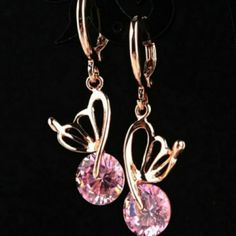 Remarkably Charming Crystal Butterfly Drop Earrings. Such An Elegant Design Earring. With Remarkable Craftsmanship. Has Hoop Style Piercing, Drop Dangle, Rose Gold With A Beautiful Butterfly That Is Connected To A Pink Crystal That Shines Gorgeously. A Stunning Earring That Brightens Up Your Look, Compliments You In Every Way, Works Well With All Your Fashion Appeal. Great For Daily Wear, Dress Up Or Casual. Makes A Great Gift Or Keep For Yourself. 100% Brand New And A Boutique. Pink Metal Clip-on Earrings As A Gift, Pink Metal Clip-on Earrings For Gift, Pink Metal Hoop Earrings, Pink Round Clip-on Earrings For Gift, Pink Round Pierced Hoop Earrings, Pink Crystal Single Earring For Gift, Elegant Pink Metal Earrings, Pink Metal Drop Earrings, Pink Metal Single Earring