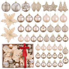 christmas ornaments and decorations are arranged in a box