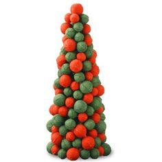 an orange and green christmas tree made out of balls