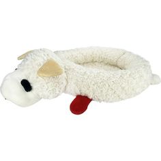 a white sheep with a red nose laying down