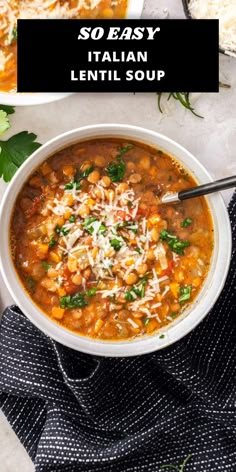 a white bowl filled with soup and topped with parmesan cheese on the side