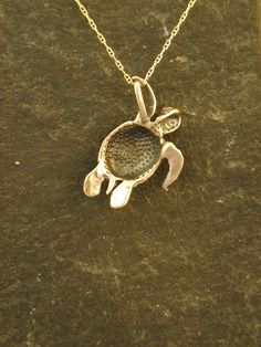 "The Sea Turtle pendant is 14K Gold. The 14K Gold Chain as pictured is 18\". This Sea Turtle pendant measures 15/16\" long by 3/4\" across. I hand cast all my pieces using the lost wax casting method. Please ask your needs. You may call me with questions, often I am out so please use my machine. 831-476-3176. Satisfaction Guaranteed! This item is made and ready to ship This piece ships USPS First Class Insured I send items USPS First Class unless otherwise directed. I send as soon as I can, usua Hand Cast Oval Gold Jewelry, Hand Cast Gold Jewelry In Oval Shape, Gold Medallion Jewelry Hand Cast, Gold Medallion Hand Cast Jewelry, Hand Cast Pendant Jewelry For Anniversary, Custom Gold Sterling Silver Necklace, Nickel Free, Hand Cast Sterling Silver Bronze Jewelry, Nickel Free Yellow Gold Jewelry For Collectors, Hand-cast Brass Jewelry For Anniversary