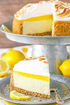 a slice of lemon meringue cheesecake on a plate