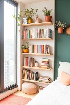 a bedroom with bookshelves and plants on the wall next to a large window