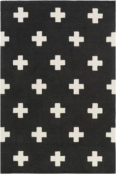 a black and white rug with crosses on the front, in various sizes and colors