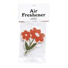 an air freshener sticker with flowers on it