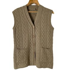 "Chunky coastal grandma wool blend cable knit jeweled button up sweater vest. Label has been removed but pretty sure it is vintage. Neutral beige toned. Excellent preowned condition with minimal wear. No materials tag but feels like wool. Measures out to a size M. Flat measurements: Shoulder to hem: 24\" Armpit to armpit: 18\"" Fitted Beige Cable Knit Sweater Vest, Fall Beige Sweater Vest With Buttons, Button Up Sweater Vest, Button Up Sweater, Coastal Grandma, Neutral Beige, Vest Outfits, Sweater Vest, Womens Vest