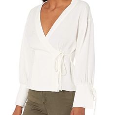 Brand New Lowest Price On Posh Nwt Moon River Ivory Wrap Top With Tie Sleeves Size Medium Features: Ivory Color Blouse V-Neckline Tie Closure 55% Viscose, 29% Polyester, 16% Polyamide Dry Clean Only Size M Approx. Measurements (Laying Flat): Underarm To Underarm - 18.5" Length From Shoulder To Hem - 22" Check Out My Closet For Outfits Perfect For: Beach Beachy Birthday Boho Bohemian Bridal Caftan Chic Christmas Classic Contemporary Coachella Coat Cottagecore Cover Up Coverup Cruise Date Night Dr Elegant Off White V-neck Top, Off White V-neck Top For Daywear, Versatile White Blouse For Fall, Versatile White Fall Blouse, Off White V-neck Blouse For Day Out, Off White V-neck Top For Fall, White Blouse For Fall Daywear, Cream Blouse For Brunch In Fall, Off White Fall Tops For Workwear