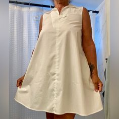 So Comfortable And Easily Dressed Up Or Down! Best Of All? Pockets. This Dress Is A Small And My Dress Size Is A 10 And Fits Me Perfectly. I Should Know - I Own It In Black! It Is A Minidress And Falls About 2” Above The Knee. I’m 5’-4 1/2” And It’s The Perfect Length. 100% Cotton - Poplin Reasonable Offers Considered~ Cotton Collared Shift Dress, Shift A-line Mini Dress For Daywear, Daywear Shift Fit A-line Mini Dress, Daywear A-line Shift Mini Dress, Chic Cotton Shirt Dress For Daytime, White Collared Daywear Dress, White Collared Dress For Daywear, White Shift Shirt Dress For Day Out, White Collared Casual Dress