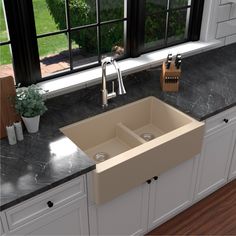 This classic apron front farmhouse design with its deep 9-1/4 in. apron blends function and form beautifully, and will look incredible in your kitchen. It is manufactured from an extremely durable quartz composite material that will provide years of trouble-free use. This quartz farmhouse kitchen sink practical design is available in a selection of 6 elegant color choices to compliment any decor. The QA-760 34-inch double bowl 60/40 split allows you to separate spaces for cleaning dishes. Karran Farmhouse Apron, Bowl Kitchen Sink, Elegant Color, Kitchen Sinks, Sink In, Farmhouse Design, Kitchen Sink, Apron, Farmhouse