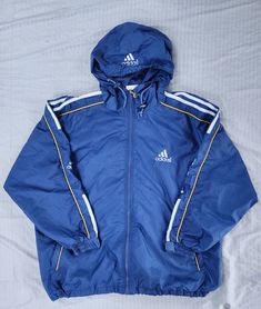 Vintage 1990s Adidas Equipment Blue White Yellow Mesh Lining Light Windbreaker Jacket Small In great condition  Normal wear  Small 26.5 x 25.5 Pit to Pit Any questions feel free to reach out! Adidas Skateboarding Jacket, Cheap Blue Adidas Bags, Cheap Blue Track Jacket For Sports, Vintage Blue Adidas Jacket, Cheap Vintage Blue Windbreaker, Adidas 90s Coat, Vintage Blue Outerwear For Sports, Adidas Equipment, Adidas Vintage