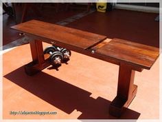 a wooden table with two wheels on it